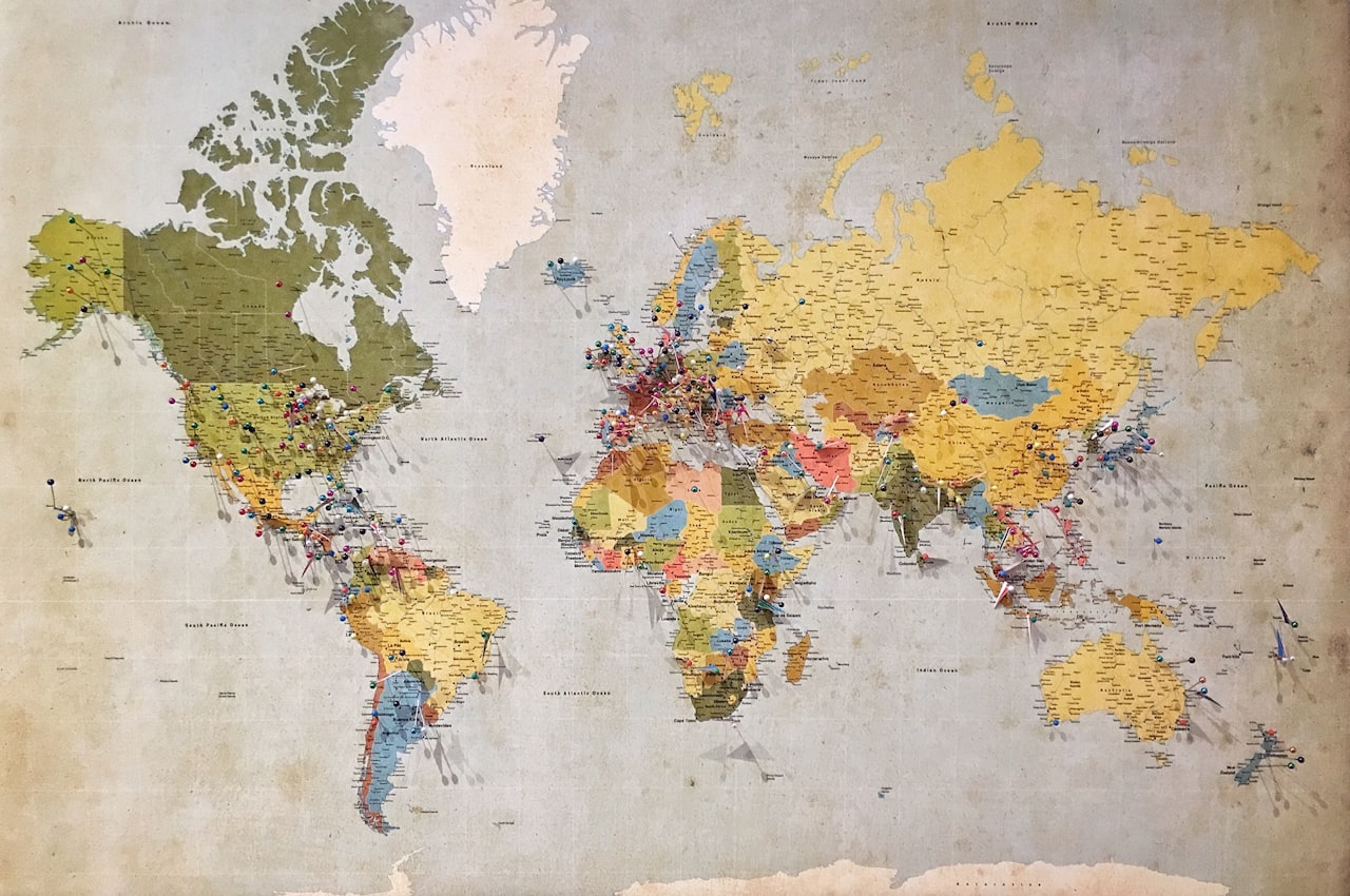 A world map with location pins on it